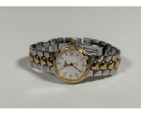 A Longines Conquest automatic bracelet watch, the circular ivory dial signed "Longines Automatic Swiss" with gilt baton index