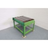 Tee Slotted Bolt On Table. Size 1300mm x 925mm. Thickness: 190mm.With Coolant Trough.On Steel Stand.
