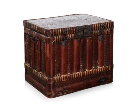 A CHINESE BAMBOO AND CANE TRUNK
Circa 19th Century or earlier, a rectangular storage trunk in cane with bamboo binding and el