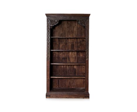AN INDONESIAN TEAK BOOKCASE
Late 19th/Early 20th Century reclaimed timber, rectangular bookcase with four shelves, carved ros
