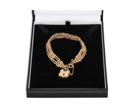 A 9CT GOLD GATE LINK BRACELET, padlock, 21.6 g.