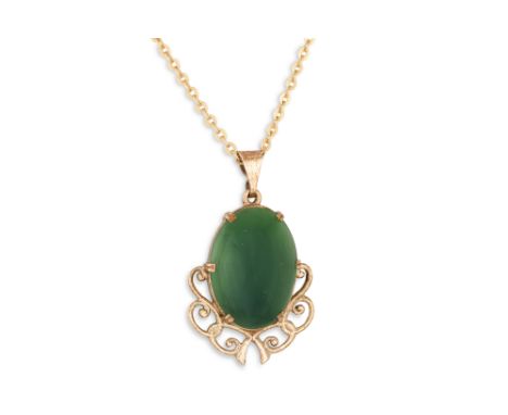 A JADE PENDANT, mounted in 9ct gold, on a 18ct gold chain, 4.4 g.