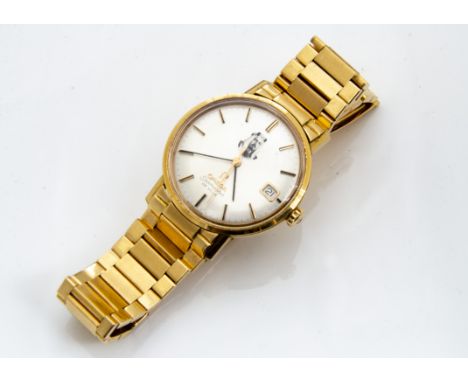 An interesting 1960s Omega Seamaster De Ville 18ct gold gentleman~s wristwatch, 34mm case, silver dial with baton numerals an