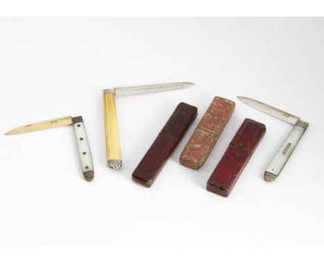 Three George III and later silver bladed folding pocket fruit knives, each with a card box, one with mother of pearl handles 