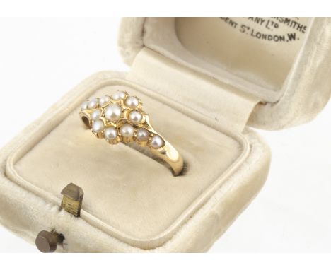 A Victorian 18ct gold seed pearl cluster ring, with half cut pearls on a yellow gold shank, hallmarked Birmingham 1899, ring 