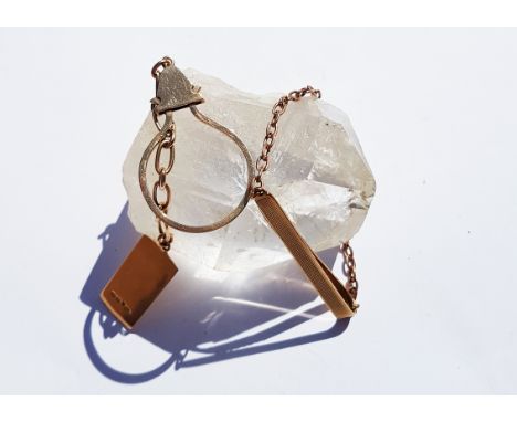 A 9ct gold keyring, the circular pinched clasp with oval linked chain and rectangular name plate together with a 9ct gold eng
