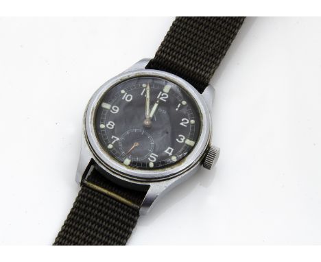 A Timor stainless steel military issue wristwatch, similar to a Dirty Dozen example, 36mm case, satin case, appears to run, e