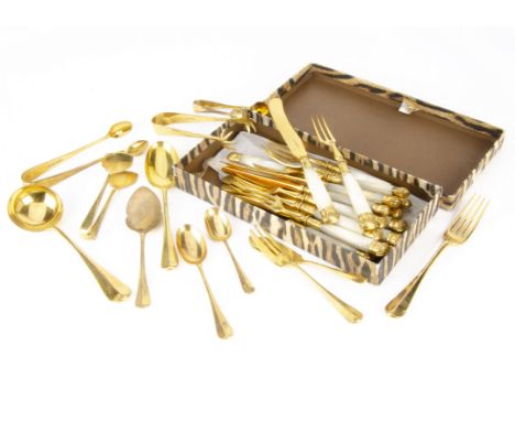 A canteen of gilt cutlery, a large quantity, together with a mother of pearl handled dessert service, and other knives 