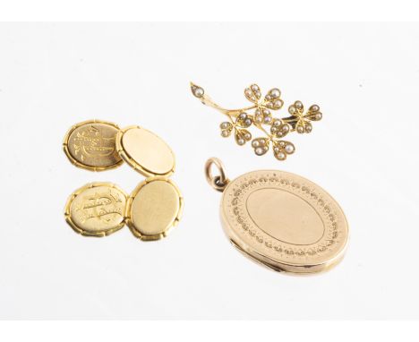 A pair of 18ct gold oval linked cufflinks, with a monogrammed engraved initial within a sectional frame and oval links, 14g t