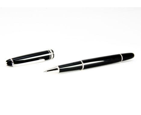 A Mont Blanc Meisterstuck roller ball pen, black with platinum mounts and clip, good condition