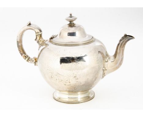 A Victorian silver teapot by Edward Barnard &amp; John Barnard, circular on socle base, London 1861, 23 ozt