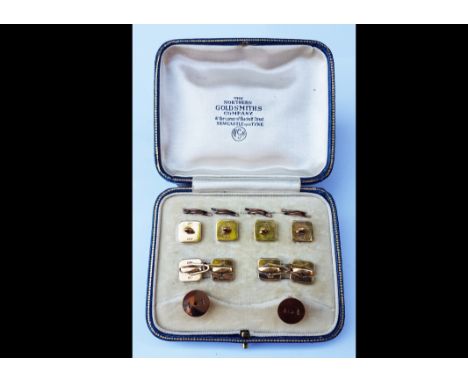 An 18ct and 9ct gold mother of pearl and seed pearl dress stud set, comprising four studs with split rings, two waistcoat stu