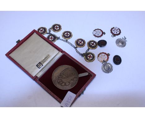 A job lot of assorted enamel badges and medals etc 