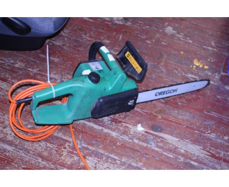 A working electric chainsaw 