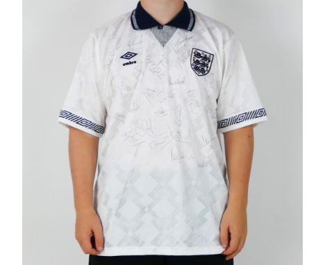 An England Umbro 1990 Home Shirt, signed by various footballers and managers including Alan Shearer, Nigel Clough, Des Walker