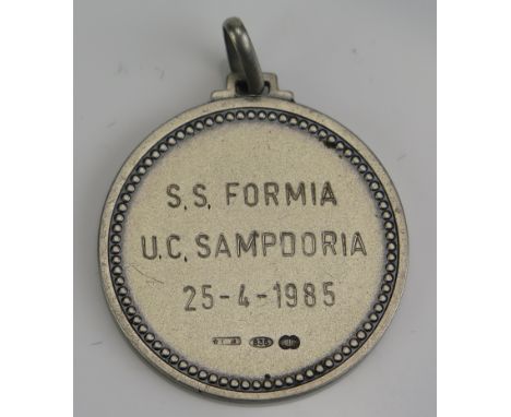A silver medallion inscribed S.S. Formia 25-4-1985, the reverse inscribed S.S. Formia under a coat of Arms, 30mm, 11gms*SOLD 