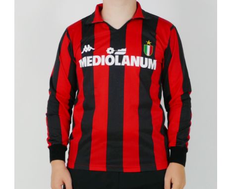 An A C Milan 1989-90 season shirt bears No. 9 to the back for Marco Van Basten, second consecutive European Cup winner’s titl