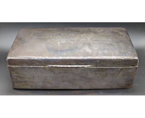 An early 20th century cigarette box, engine turned top, monogrammed, L.18cm, gross weight 640g,