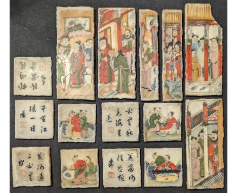 A collection of 19th century Chinese tiles depicting figural scenes and character marks, double sided, the reverse depicting 