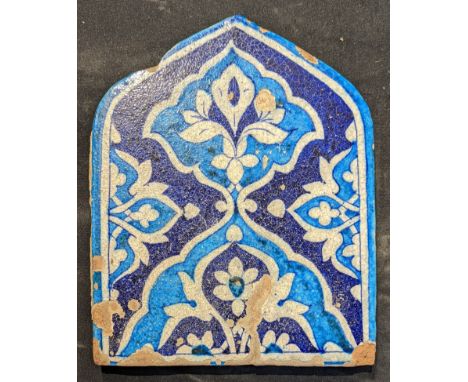 An 18th or 19th century Islamic multan tile, H.25cm