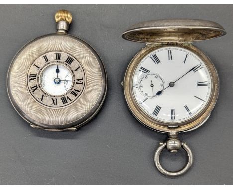 A J.W.Benson half hunter silver pocket watch, engine turned outer case, the dial marked J.W.Benson London, sunken subsidiary 