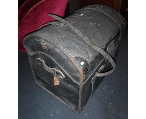 A VICTORIAN DOME TOP CABIN TRUNK with leather corners and straps