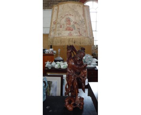 AN ORIENTAL ROOT WOOD CARVED STUDY of a fisherman (as a table lamp)