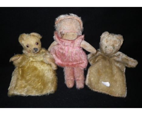 A VINTAGE TEDDY BEAR FORMED HAND PUPPET and two similar items