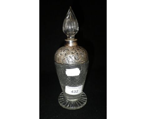 A SILVER MOUNTED CUT-GLASS SCENT FLASK