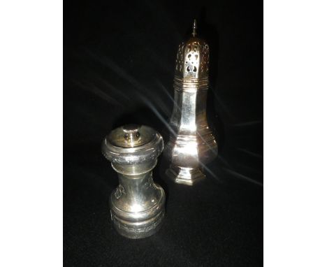 A GEORGE III STYLE OCTAGONAL SUGAR CASTOR and a similar silver pepper grinder