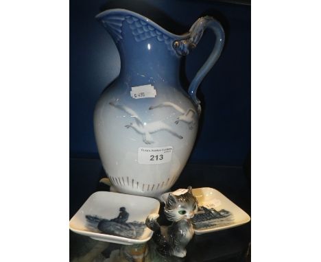 A DANISH BING & GRONDAHL CERAMIC JUG decorated with gulls, a pair of Danish Royal Copenhagen dishes and a Goebel cat (4)