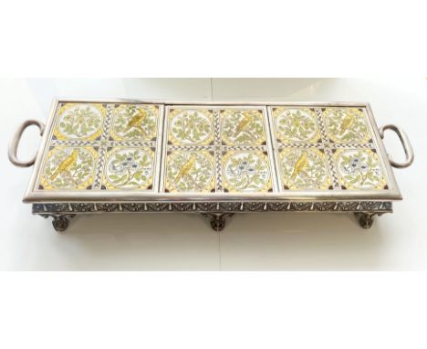William Hutton &amp; Sons Ltd, Sheffield 1910, the top set with three Minton tiles depicting birds and foliage, on six leaf-c
