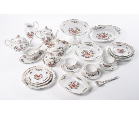 Comprising: 12 dinner plates, 12 soup bowls, 12 side plates, 2 vegetable dishes, 2 gravy boats with spoons, 12 tea cups and s