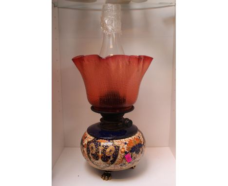 Victorian Pottery based Oil Lamp with Ruby glass shade 