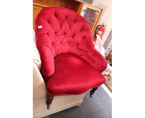 Victorian Upholstered button back chair on oak turned legs and casters 
