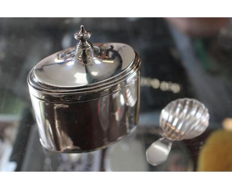 Silver Oval Tea Caddy Birmingham 1887 and a 19thC Silver Scallop Caddy Spoon 133g total weight 