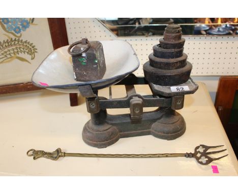 Cast Iron Weighing Balance with Weights and a Brass Toasting Fork 