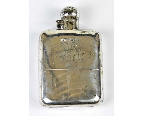 JAMES DIXON &amp; SONS; a George V hallmarked silver hip flask with detachable cup, twist action cork filled lid and engraved