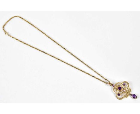 A 9ct yellow gold amethyst and pearl pendant suspended on a yellow metal chain, length of chain 42cm, length of pendant inclu