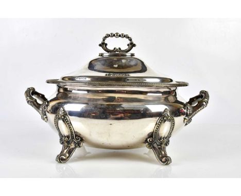 G R COLLINS &amp; CO; a Victorian silver plated tureen and cover, with cast rim and on scrolling feet, height 26cm.