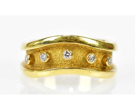 An 18ct yellow gold shaped dress ring set with five collet set round brilliant cut diamonds, size R, approx 12.4g.