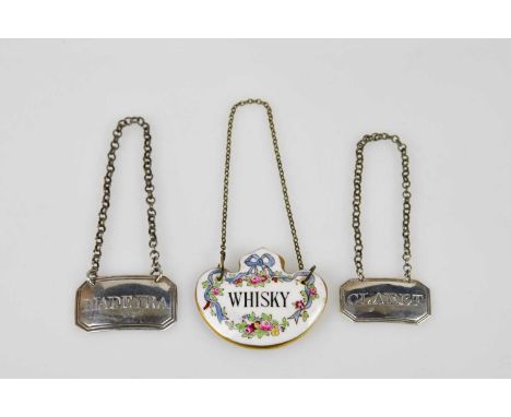 JOSEPH WILLMORE; a Victorian hallmarked silver decanter label inscribed Madeira, together WWI a further hallmarked silver dec