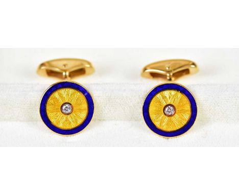 FABERGE; a pair of 18ct yellow gold blue and yellow enamel decorated diamond set cufflinks, each diamond weighing 0.10ct and 
