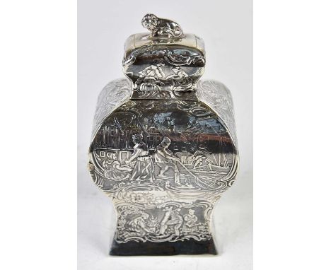 A late 19th century Ducth silver tea caddy of bombe form decorated throughout with figures, Bertold Muller import mark for Ch