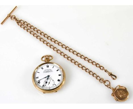 A 9ct yellow gold open face crown wind pocket watch with Roman numerals and subsidiary seconds hand, the white enamel dial in