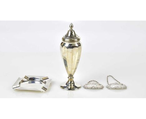 HENRY MATTHEWS; a George V hallmarked silver sugar caster with panelled decoration, Birmingham 1914, together with a hallmark