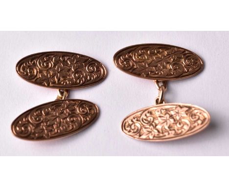 A pair of 9ct rose gold floral engraved torpedo cufflinks, J.Atkins, Birmingham 1925, approx 5.33g.