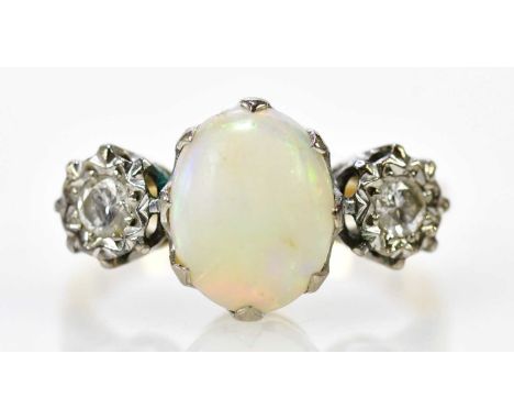 An 18ct yellow gold opal and illusion set diamond three stone ring, size L, approx 4.8g.