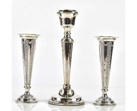 THOMAS BRADBURY &amp; SON; a pair of Victorian hallmarked silver posy vases with wavy rims and embossed/cast decoration, Shef