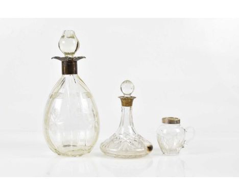 HAMMOND CREAKE &amp; CO; a George V cut glass decanter with hallmarked silver collar Sheffield 1926, a miniature cut glass sh